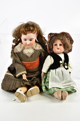 Lot 76 - ARMAND MARSEIILE; a German bisque headed doll...