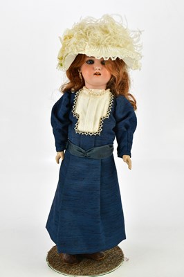 Lot 73 - SIMON & HALBIG; a German bisque headed doll...