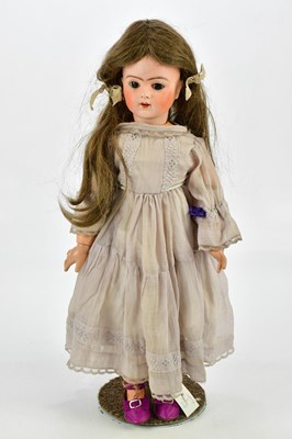 Lot 15 - BRU JNE; a bisque headed walking doll with...