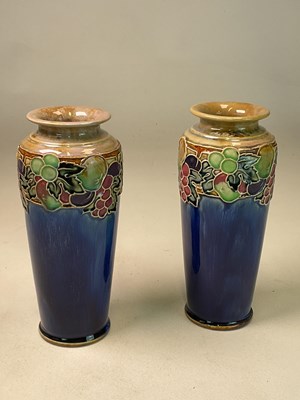 Lot 297 - ROYAL DOULTON; a pair of Art Nouveau stoneware...