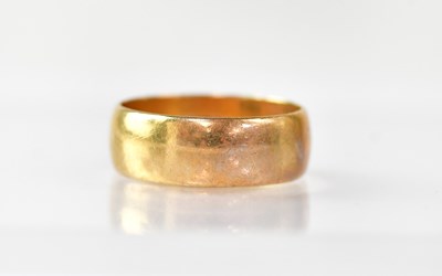 Lot 851 - A 9ct gold wide wedding band, size T, approx....