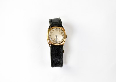 Lot 950 - A 1930s 9ct gold wristwatch, the white...