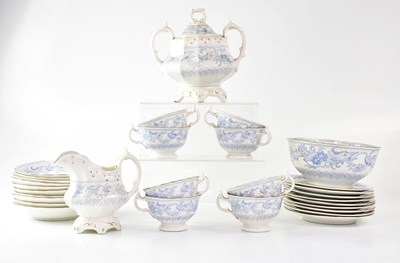 Lot 370 - A Chinese-style gilt-heightened blue and white...