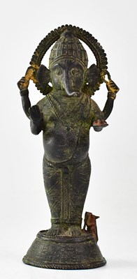 Lot 145 - A bronze figure of Ganesha holding sweets,...