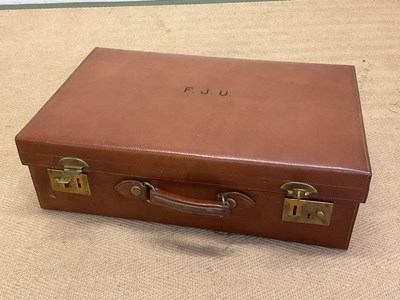 Lot 77 - A leather travel case with fitted interior,...