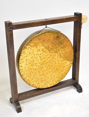 Lot 94 - A vintage brass dinner gong in an oak frame,...