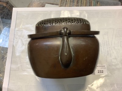 Lot 232 - A copper hand warmer, the pierced grille with...