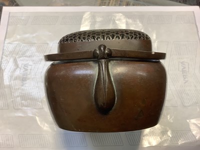 Lot 232 - A copper hand warmer, the pierced grille with...