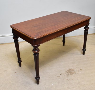 Lot 1181 - A Victorian mahogany writing table, the...