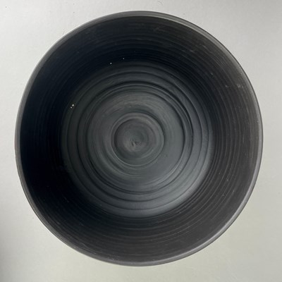 Lot 765 - TONY LAVERICK (born 1961); a black porcelain...