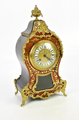 Lot 1342 - A reproduction Boulle work mantel clock, the...