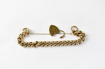 Lot 780 - A 9ct gold heavy belcher link bracelet with...