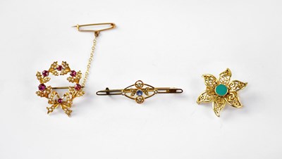 Lot 790 - Three brooches comprising a 9ct gold open...