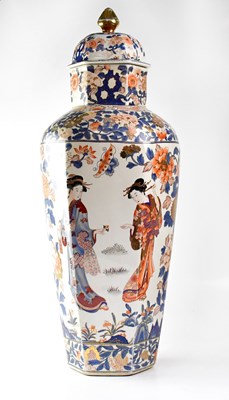 Lot 166 - A large Oriental lidded vase, decorated with...