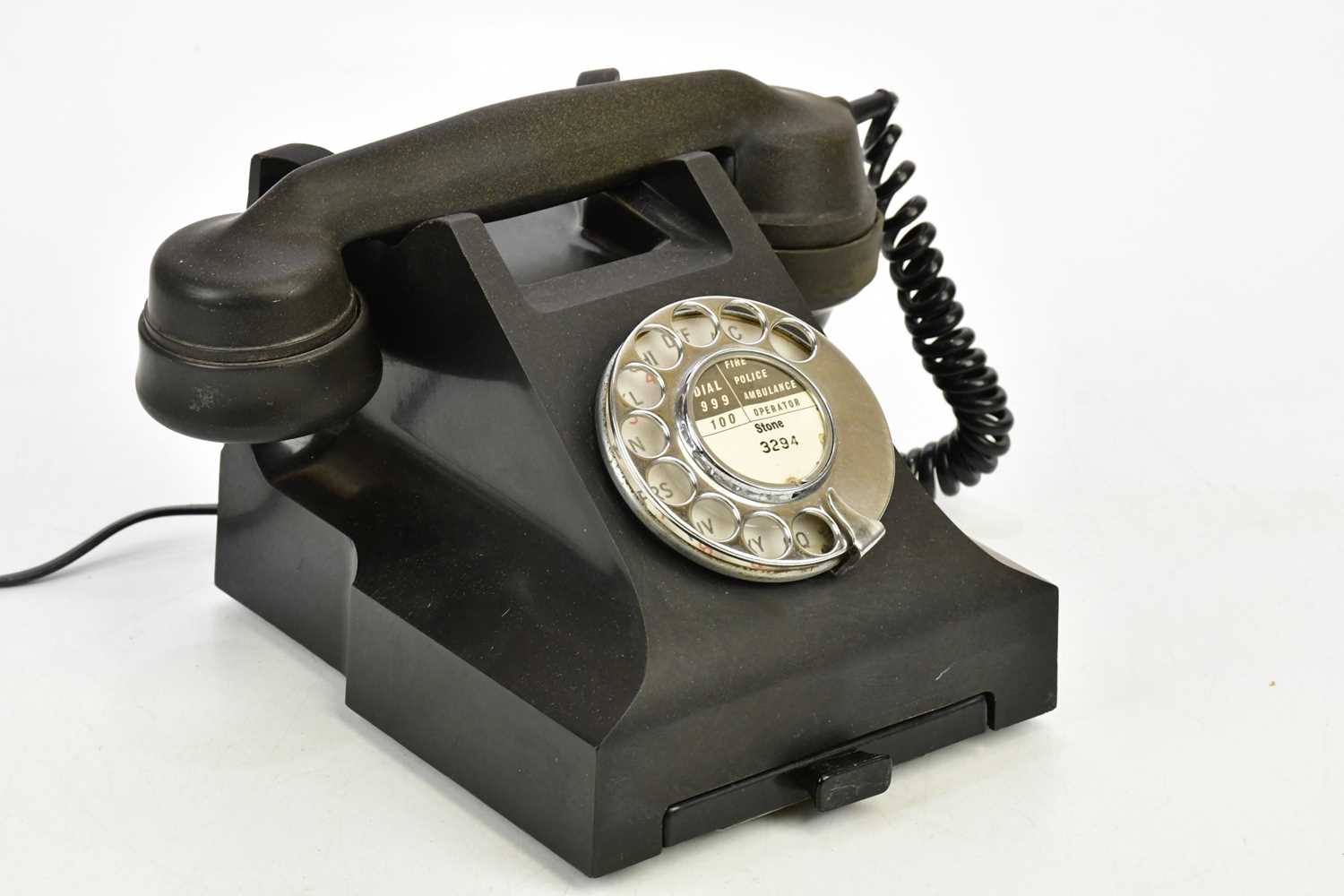 Lot 1615 - A black bakelite rotary telephone.