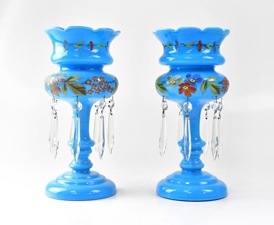 Lot 394 - A pair of blue glass table lustres painted...