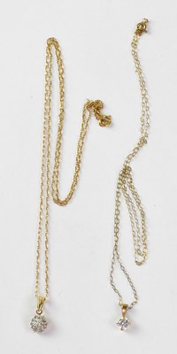 Lot 803 - Two 9ct gold necklaces, one with a single claw-...