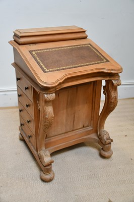 Lot 1124 - A reproduction pine Davenport with tooled...