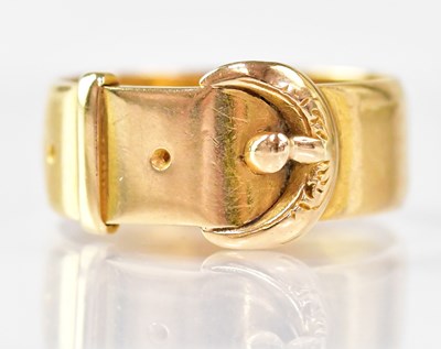 Lot 866 - An 18ct yellow gold buckle ring, size Q,...