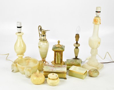 Lot 1440 - A collection of onyx items to include three...