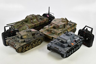 Lot 219 - A collection of three radio controlled tanks...