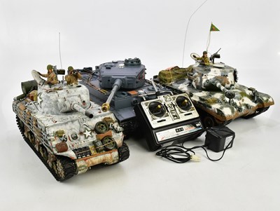 Lot 222 - Three radio controlled tanks, two lacking...