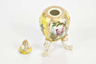 Lot 2438 - BERLIN; an egg shaped lidded vase, painted...