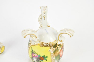 Lot 2438 - BERLIN; an egg shaped lidded vase, painted...