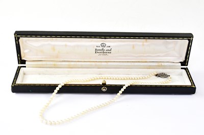 Lot 796 - A seed pearl necklace with silver clasp,...