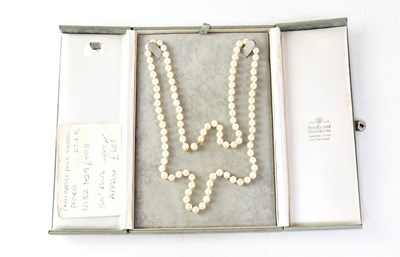 Lot 797 - A string of pink sheen pearls, length 74cm.