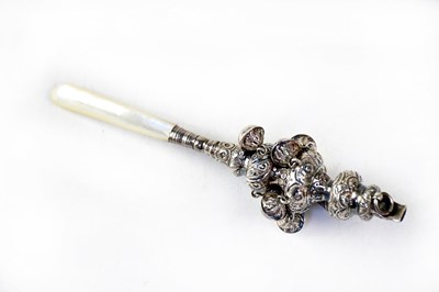 Lot 712 - A Victorian silver and mother-of-pearl rattle...