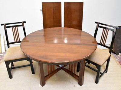 Lot 1070 - A reproduction Arts & Crafts style dining...