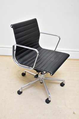 Lot 1060 - AFTER CHARLES & RAY EAMES; a contemporary...