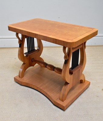 Lot 1138 - A contemporary satinwood console table with...