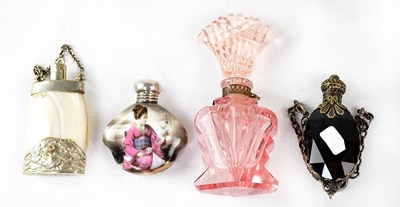 Lot 401 - Four vintage scent bottles comprising three...