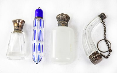 Lot 404 - Four vintage scent bottles, comprising a milk...