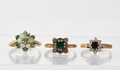 Lot 880 - Three 9ct gold rings comprising an opal and...