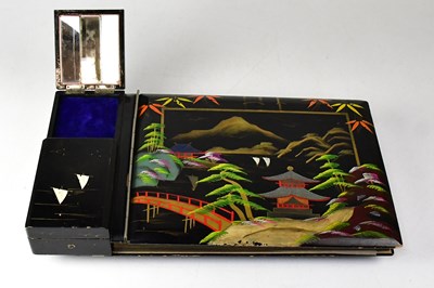 Lot 423 - A Japanese-style painted wooden musical...