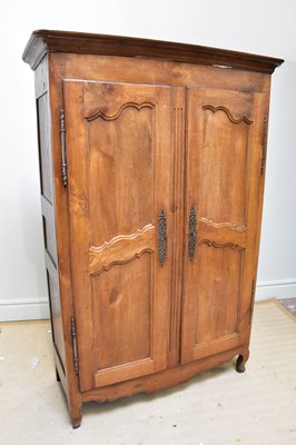 Lot 177 - A reproduction armoire with moulded cornice...