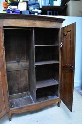 Lot 177 - A reproduction armoire with moulded cornice...