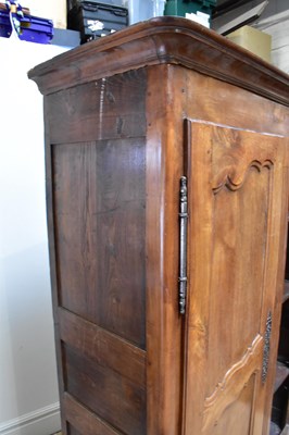 Lot 177 - A reproduction armoire with moulded cornice...