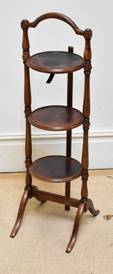 Lot 1135 - A reproduction three tier folding cake stand...