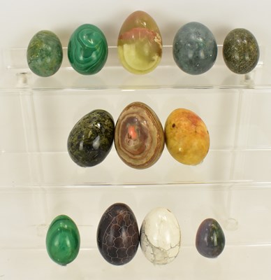 Lot 446 - Twelve polished agate eggs to include two...