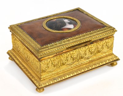 Lot 61 - LIMOGES; a gilt metal leather set rectangular...