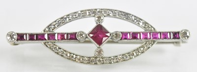 Lot 714 - A white metal Art Deco style diamond and ruby...