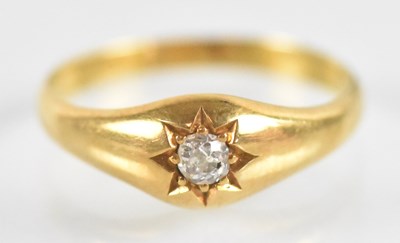 Lot 740 - An 18ct yellow gold diamond set signet ring,...