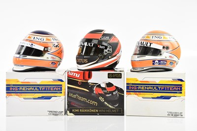 Lot 1065 - A Lotus F1 team Kimi Räikkönen mini helmet and...