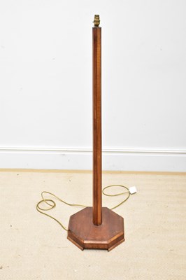 Lot 632 - An Art Deco walnut octagonal standard lamp,...