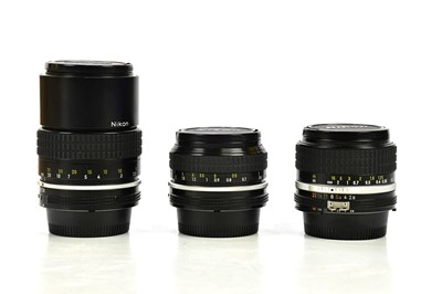 Lot 491 - NIKON; three Nikkor F lenses, comprising a...