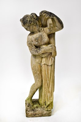 Lot 107 - A composite garden statue of a young female...